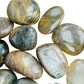 Reverse side of Black Moonstone tumbled stone, hand-selected from Amoron'i Mania, Madagascar.