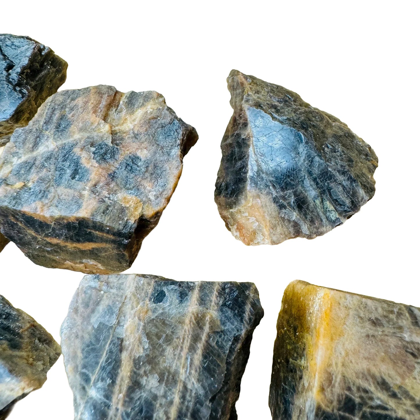 Scale reference of one Black Moonstone raw stone for scale, hand-selected from Amoron'i Mania, Madagascar.