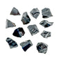 Close detail of Black Obsidian raw stone, showing natural texture.