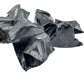 Profile view of Grade AA Black Obsidian raw stone, sourced from Argentina.