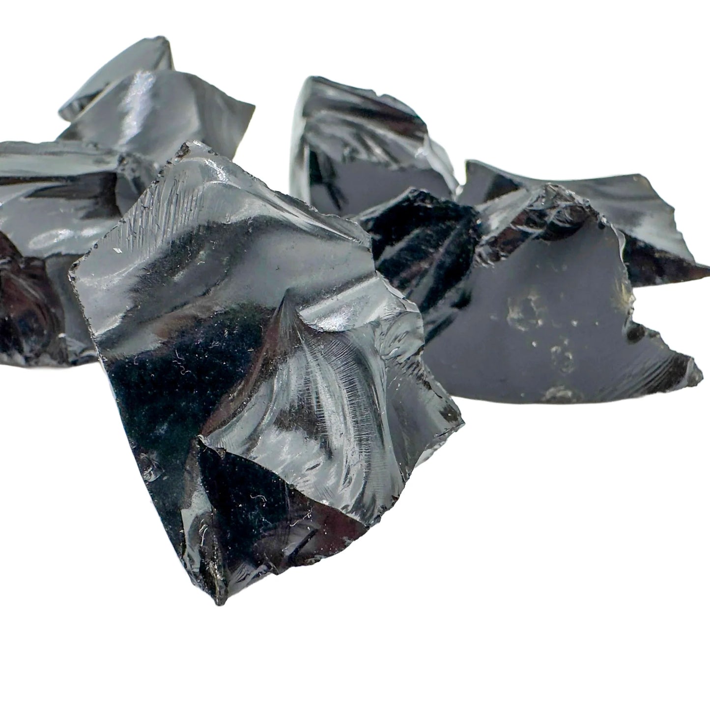 Profile view of Grade AA Black Obsidian raw stone, sourced from Argentina.