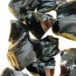 Detail shot of Grade AA Black Obsidian raw under natural light