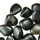 Aerial view of Grade AA Black Obsidian tumbled stone, for Protection and Grounding, sourced from Argentina.