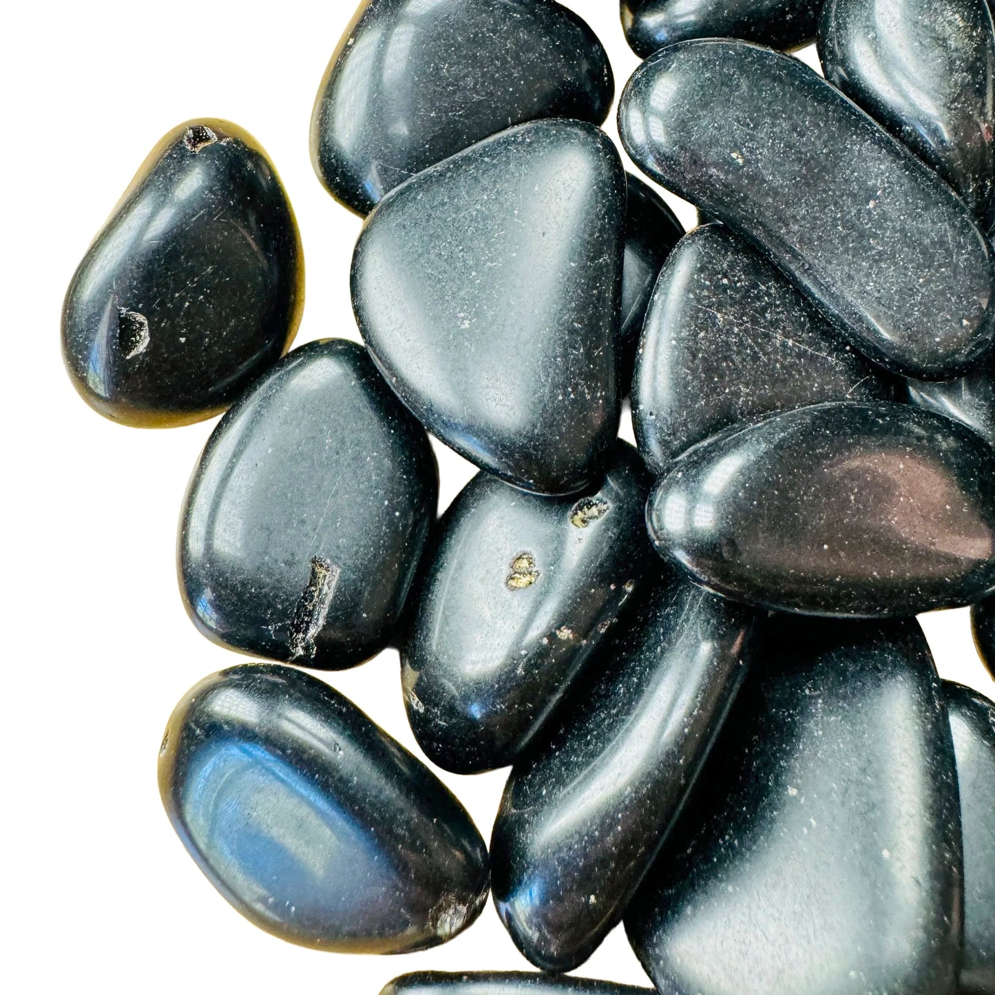 Profile shot of Black Obsidian tumbled stone, traditionally used for Protection, hand-selected from Salta Province, Argentina.