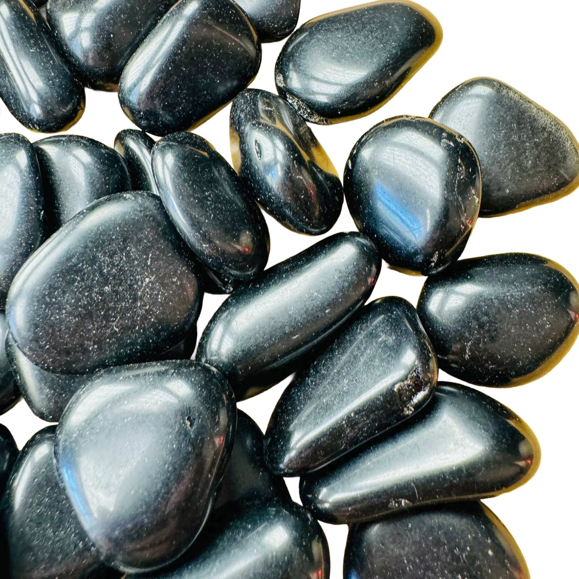 Reverse side of Black Obsidian tumbled stone, traditionally used for Protection, from Salta Province, Argentina.