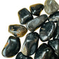 Plan view of Black Onyx tumbled stone, carried for Protection, showing translucent edges.