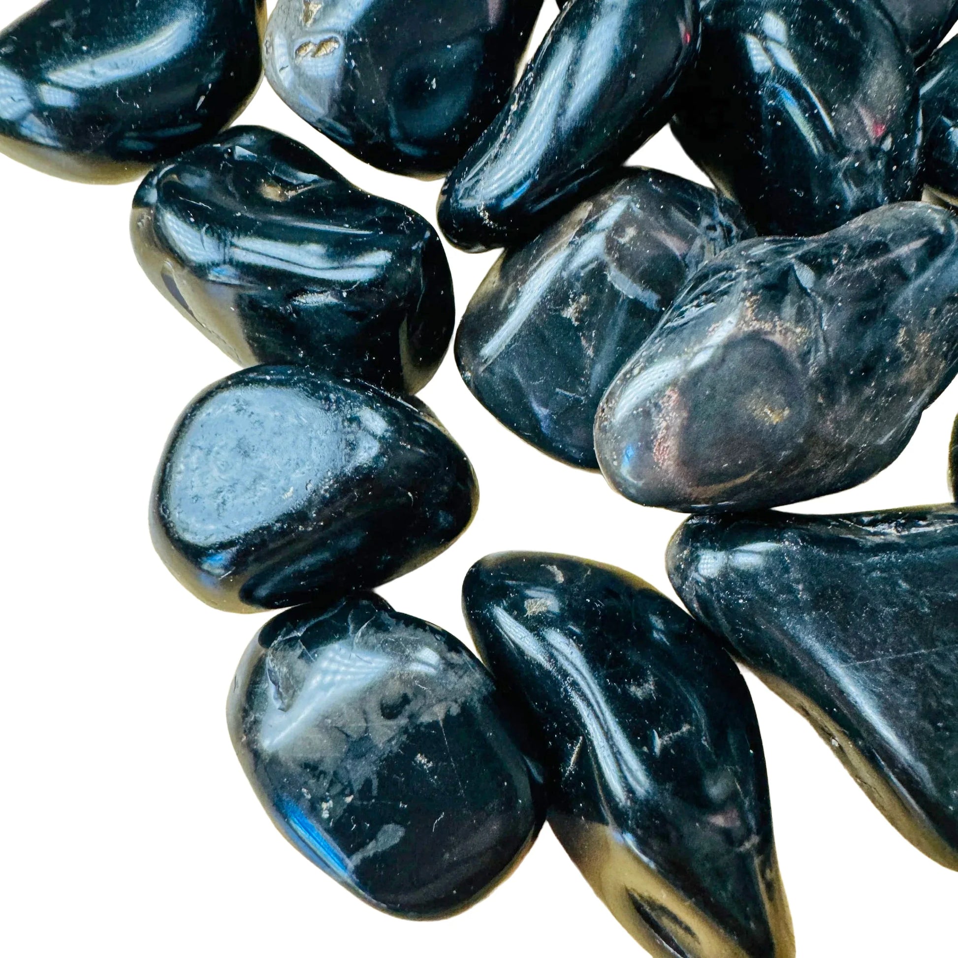 Rear view of Black Onyx tumbled stone, often worked with for Protection and Grounding.