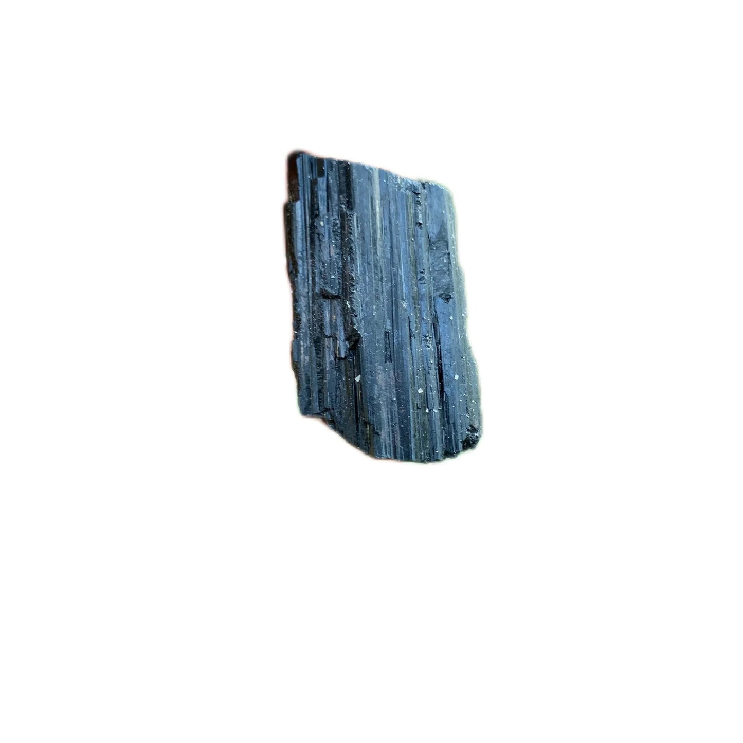 Grade aa black tourmaline raw held in hand for size reference