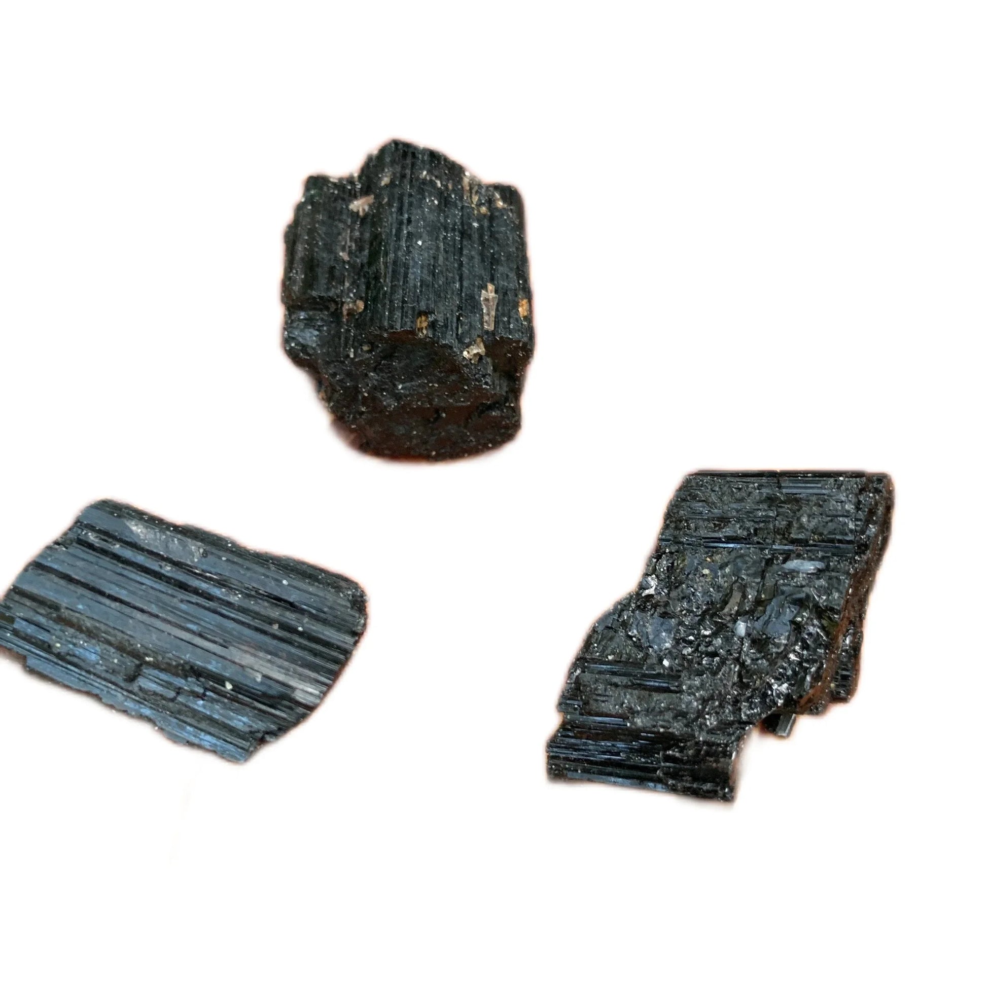 Back view of Grade AA Black Tourmaline raw showing natural surface
