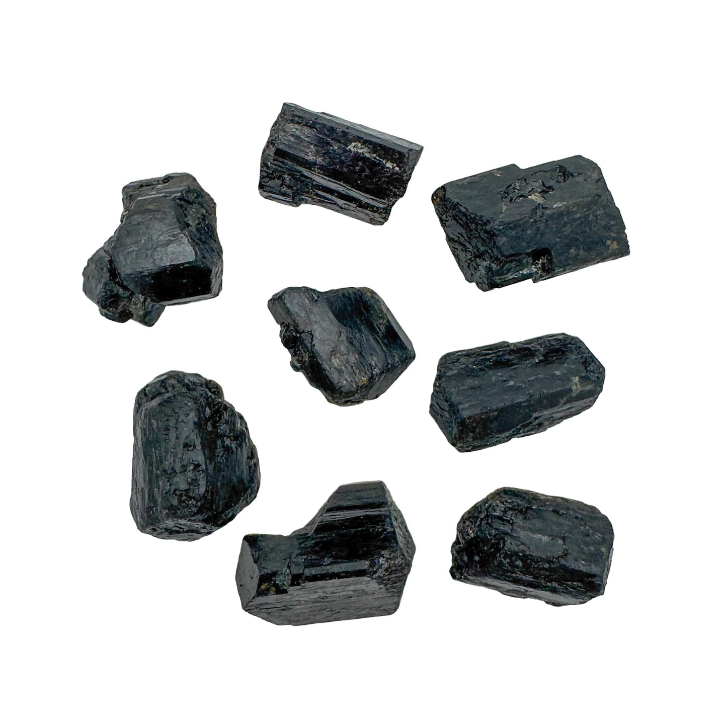 Profile view of Black Tourmaline raw stone, linked to Protection and Grounding.