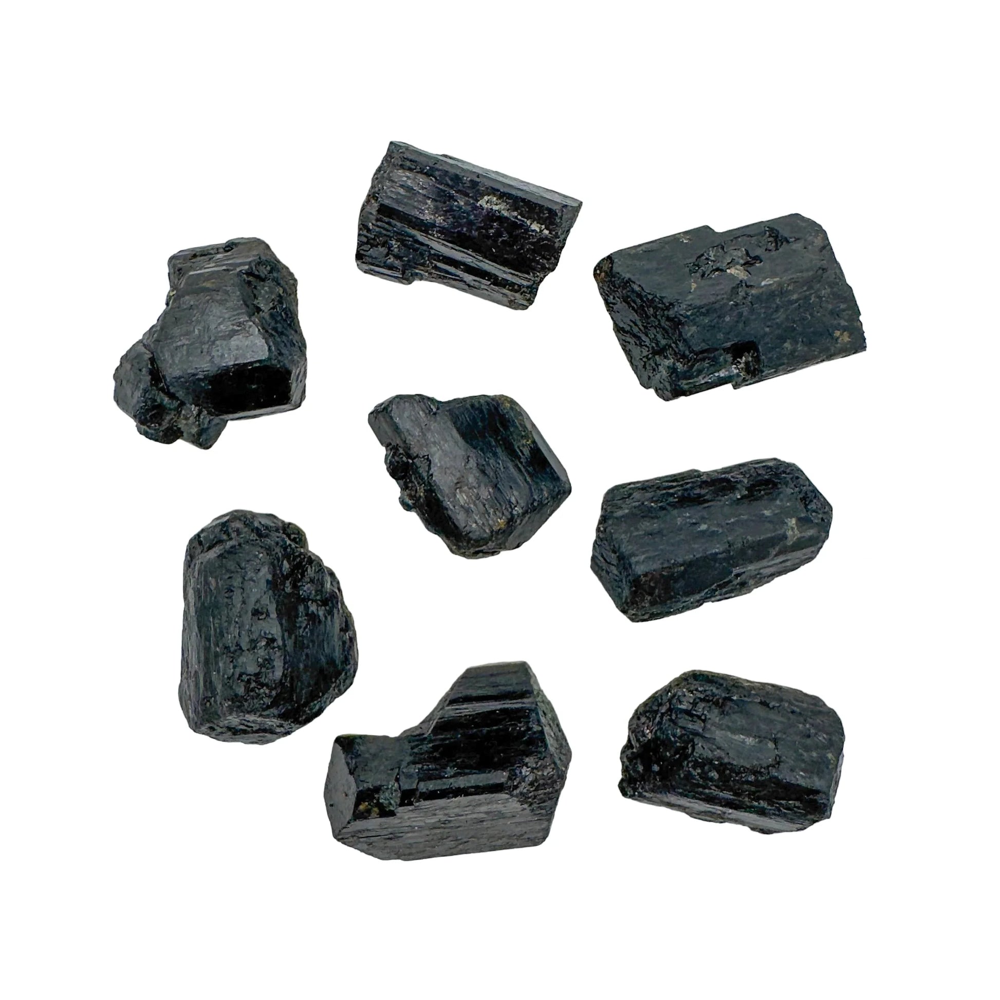 Profile view of Black Tourmaline raw stone, linked to Protection and Grounding.