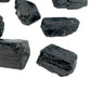 Back view of Grade AA Black Tourmaline raw stone, showing natural form, sourced from Vakinankaratra, Madagascar.