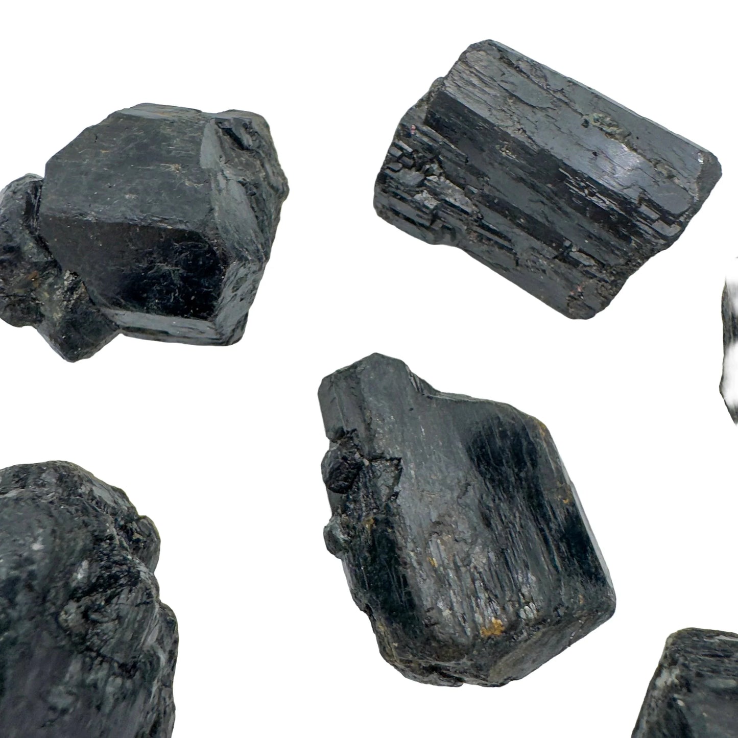 Daylight view of one Black Tourmaline raw stone for scale, Madagascar-sourced, from Vakinankaratra, Madagascar.