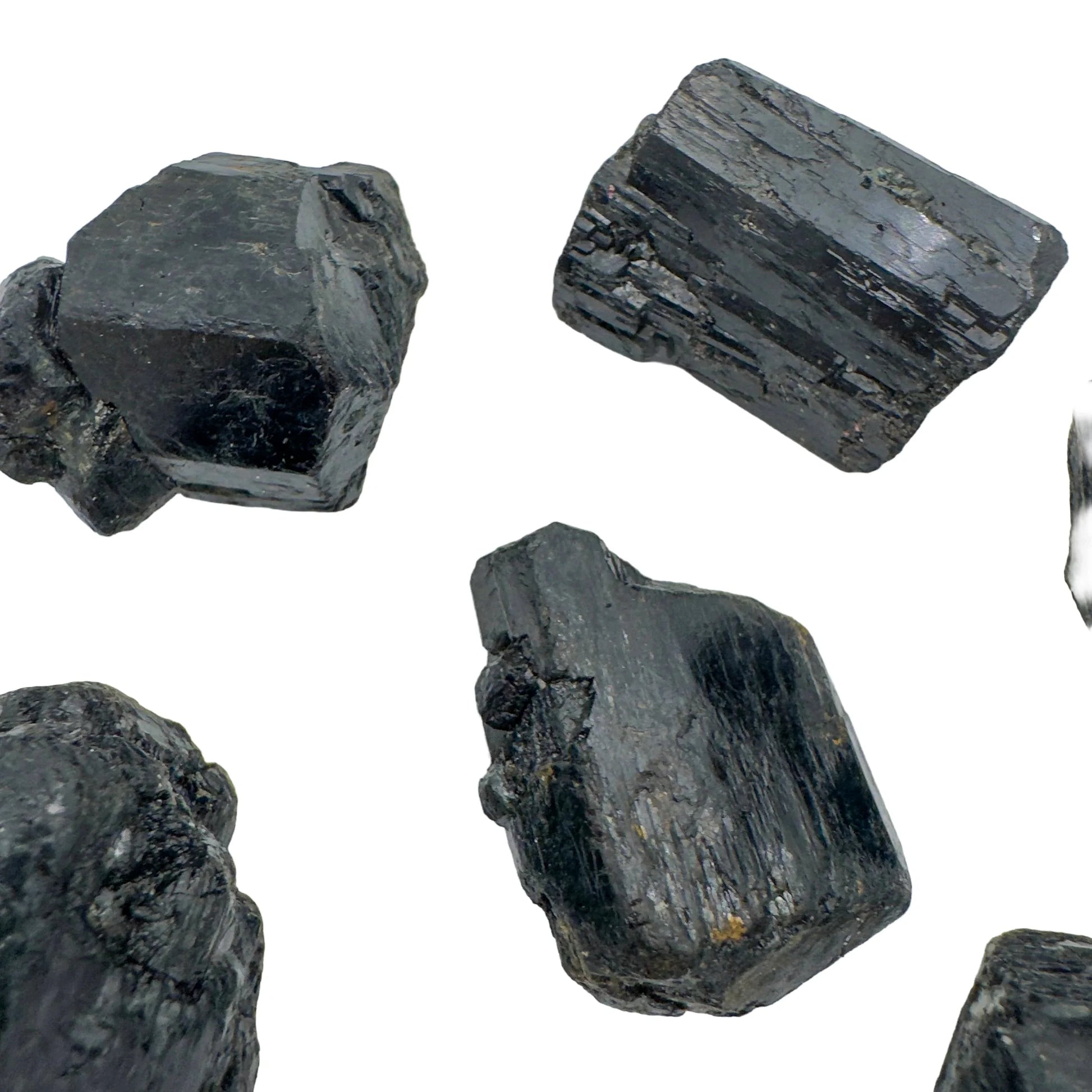 Daylight view of one Black Tourmaline raw stone for scale, Madagascar-sourced, from Vakinankaratra, Madagascar.
