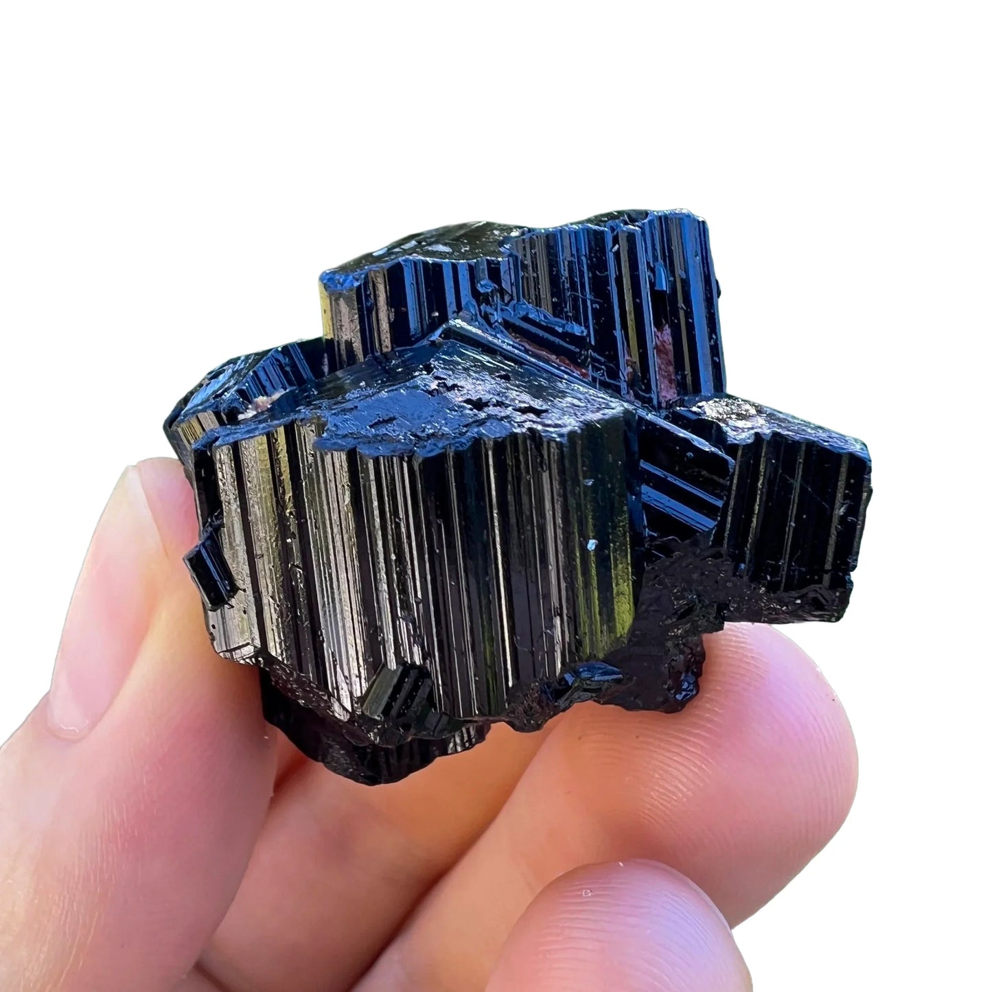 Sideways view of Black Tourmaline raw stone, Madagascar-sourced.