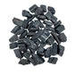 Edge-on view of Grade AA Black Tourmaline raw stone, showing characteristic finish.