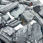 Alternate angle of Grade AA Black Tourmaline raw showing overall shape