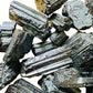 Detail shot of Grade AA Black Tourmaline raw under natural light