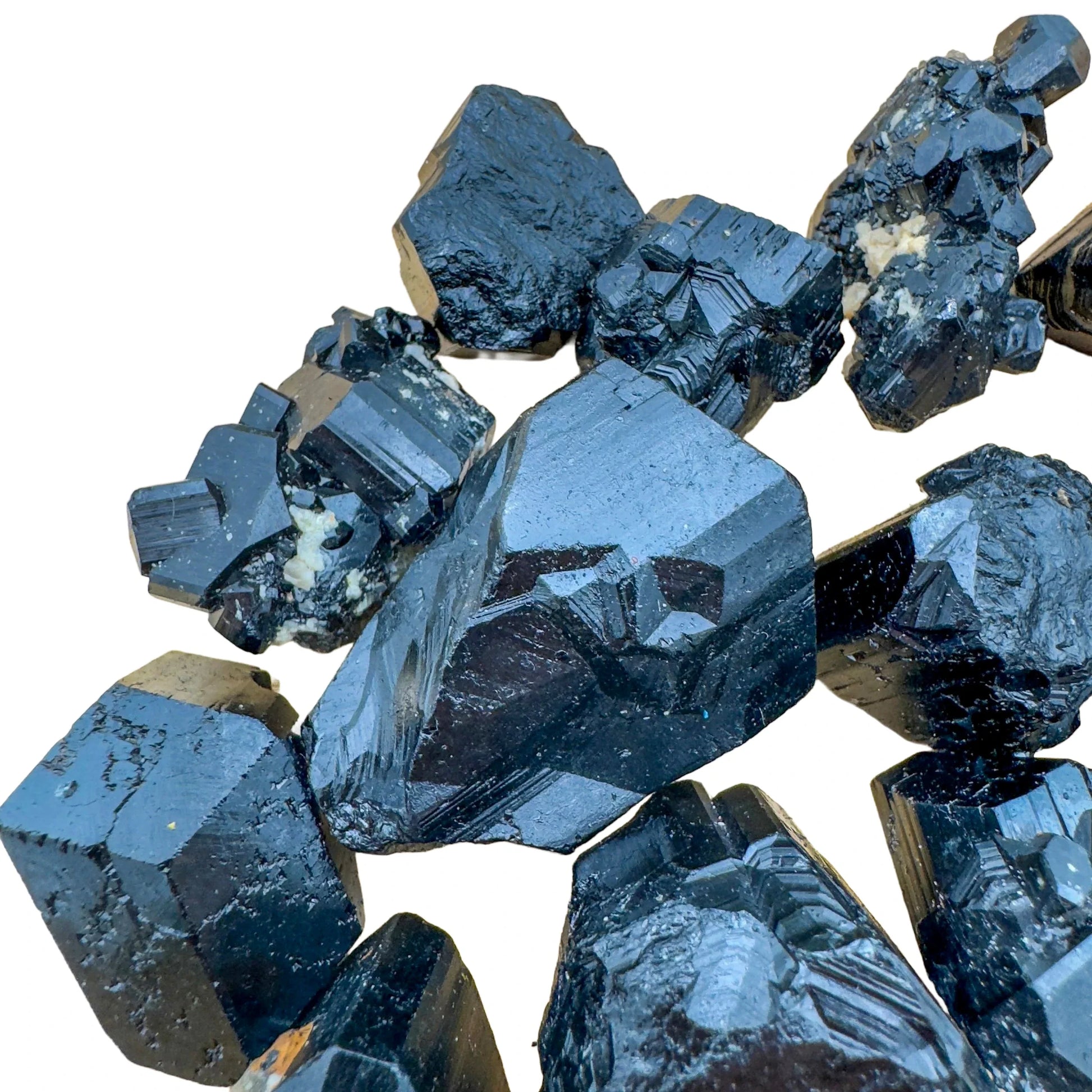 Looking down on Black Tourmaline raw stone, showing open form, linked to Protection and Grounding.