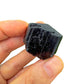 Detail shot of Grade AA Black Tourmaline raw under natural light