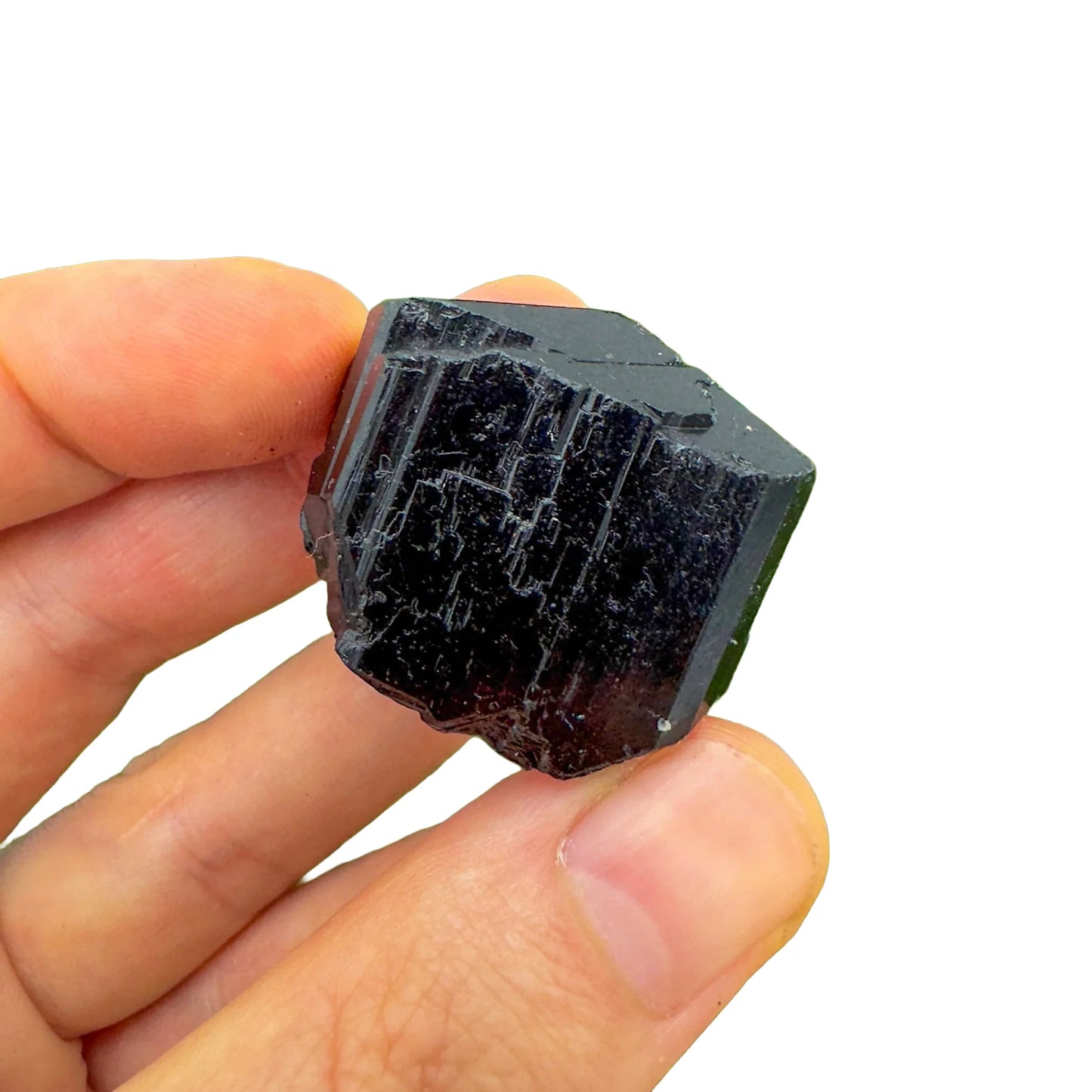 Detail shot of Grade AA Black Tourmaline raw under natural light