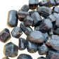 Daylight view of a single Black Tourmaline raw stone from Zimbabwe.