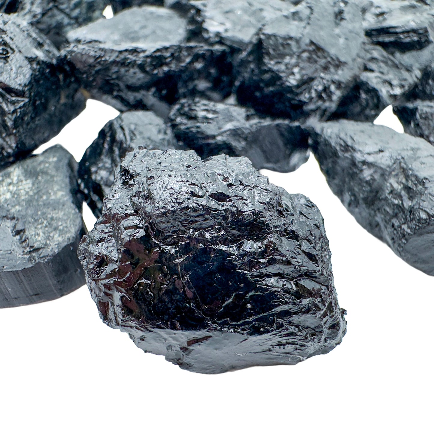 Overhead angle of Black Tourmaline raw stone, from Minas Gerais, Brazil, showing characteristic patterning.