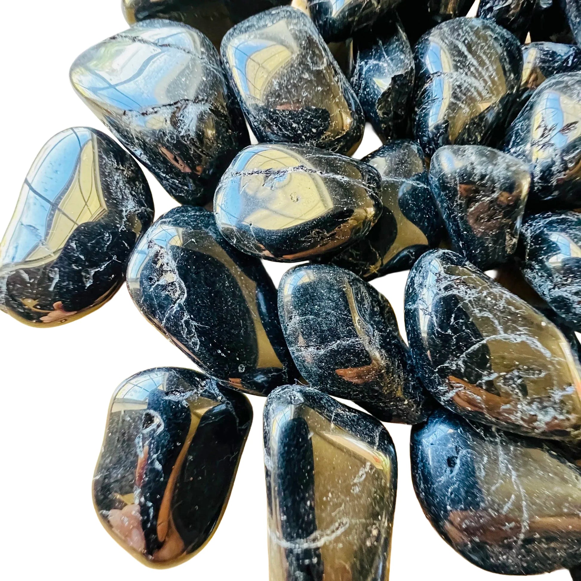 Natural surface of Black Tourmaline tumbled stone, kept close for Protection.