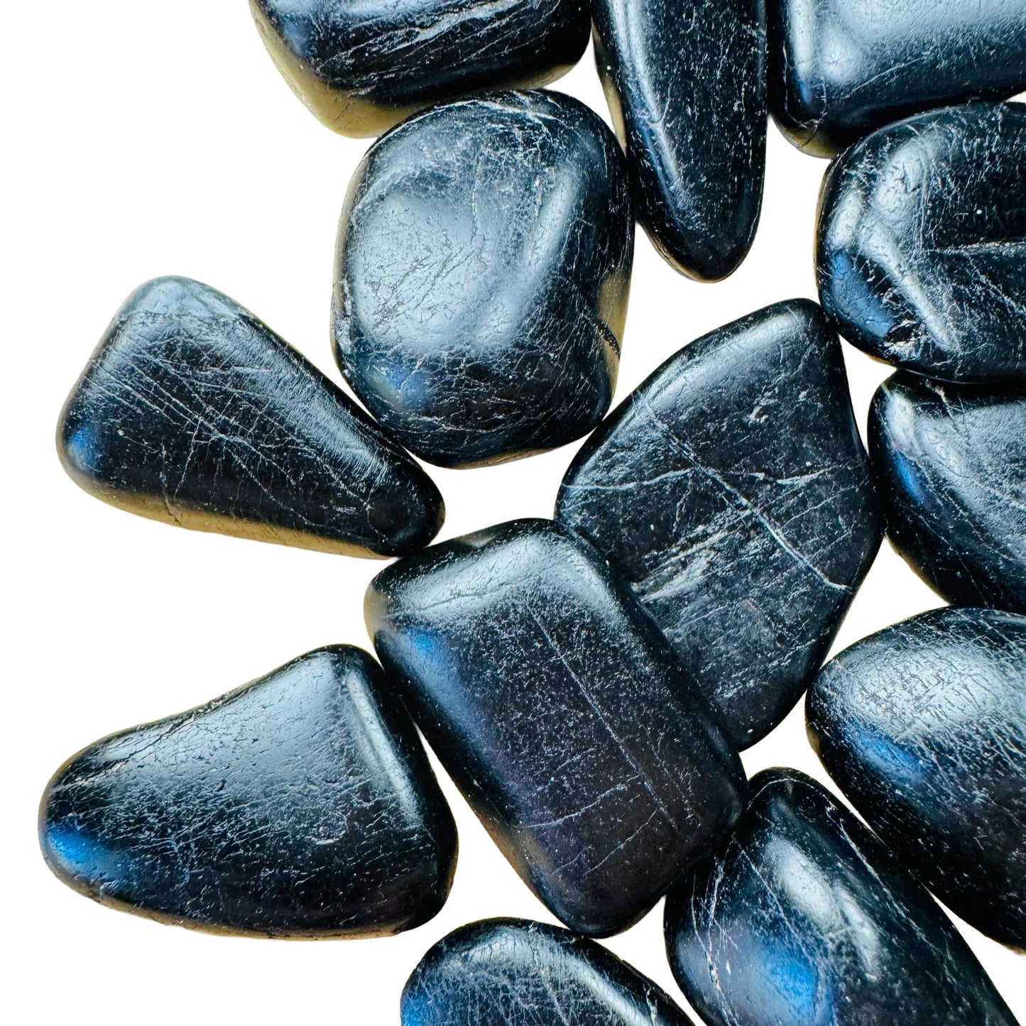Profile shot of Black Tourmaline tumbled stone, hand-selected from Minas Gerais, Brazil.