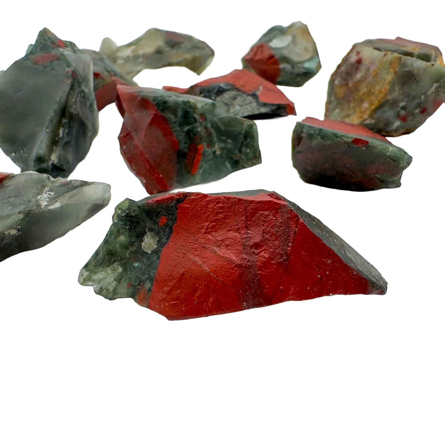 Top-down shot of Grade AA Bloodstone raw stone, from Eswatini, showing tight grain.