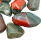 Looking down on Bloodstone tumbled stone, showing characteristic patterning, Eswatini-sourced.
