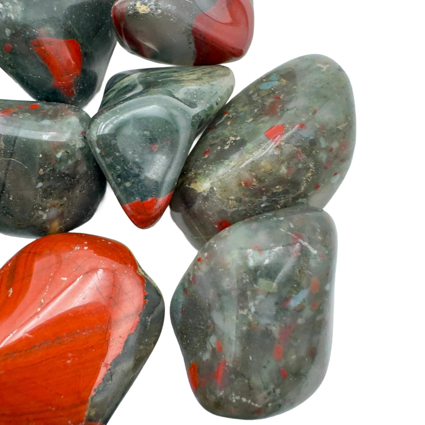 In context of a Bloodstone tumbled stone, from Hhohho, Eswatini, often kept for Confidence, showing natural surface character.