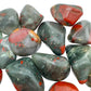 Back view of Grade AA Bloodstone tumbled stone showing natural surface