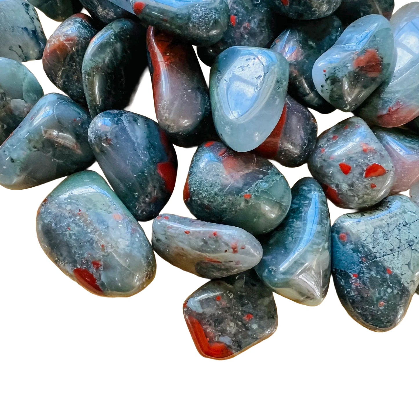 Natural surface of Bloodstone tumbled stone, sourced from Hhohho, Eswatini.