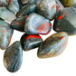Underside view of Bloodstone tumbled stone, showing characteristic patterning.