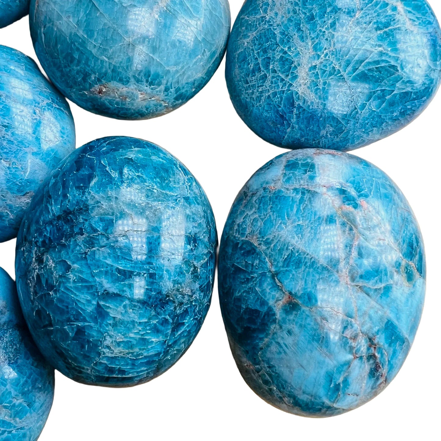 Overhead angle of Apatite palm stone, showing glassy finish.
