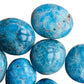 Alternate angle of Apatite palm stone, showing natural variation, sourced from Madagascar.