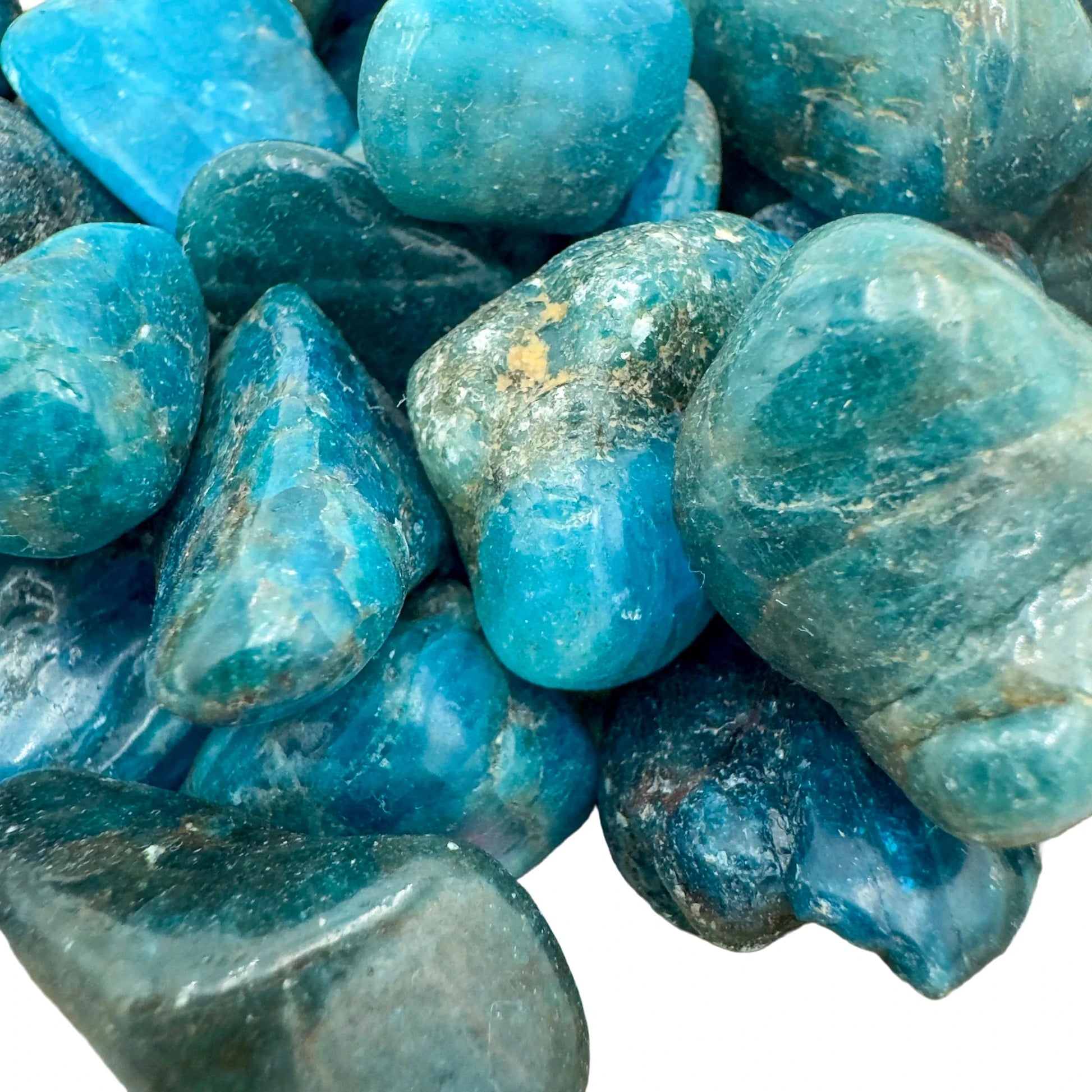 Looking down on Grade AA blue Apatite tumbled stone, worked with for Focus.