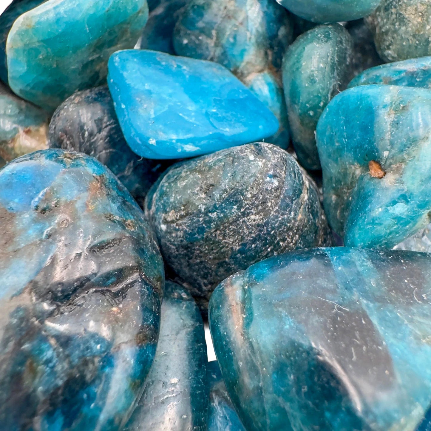 Alternate side of Apatite tumbled stone, sourced from Madagascar, worked with for Focus and Manifestation.