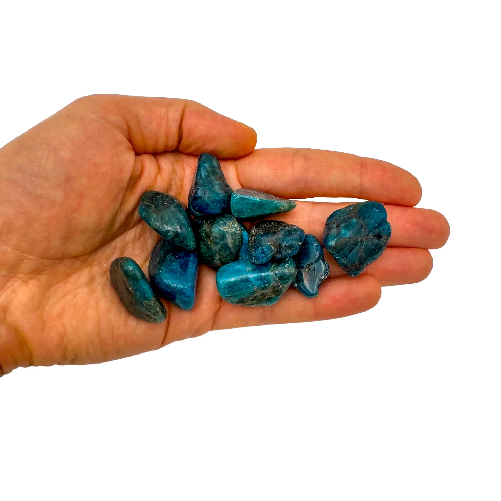 Detail shot of Grade AA Apatite tumbled stone under natural light