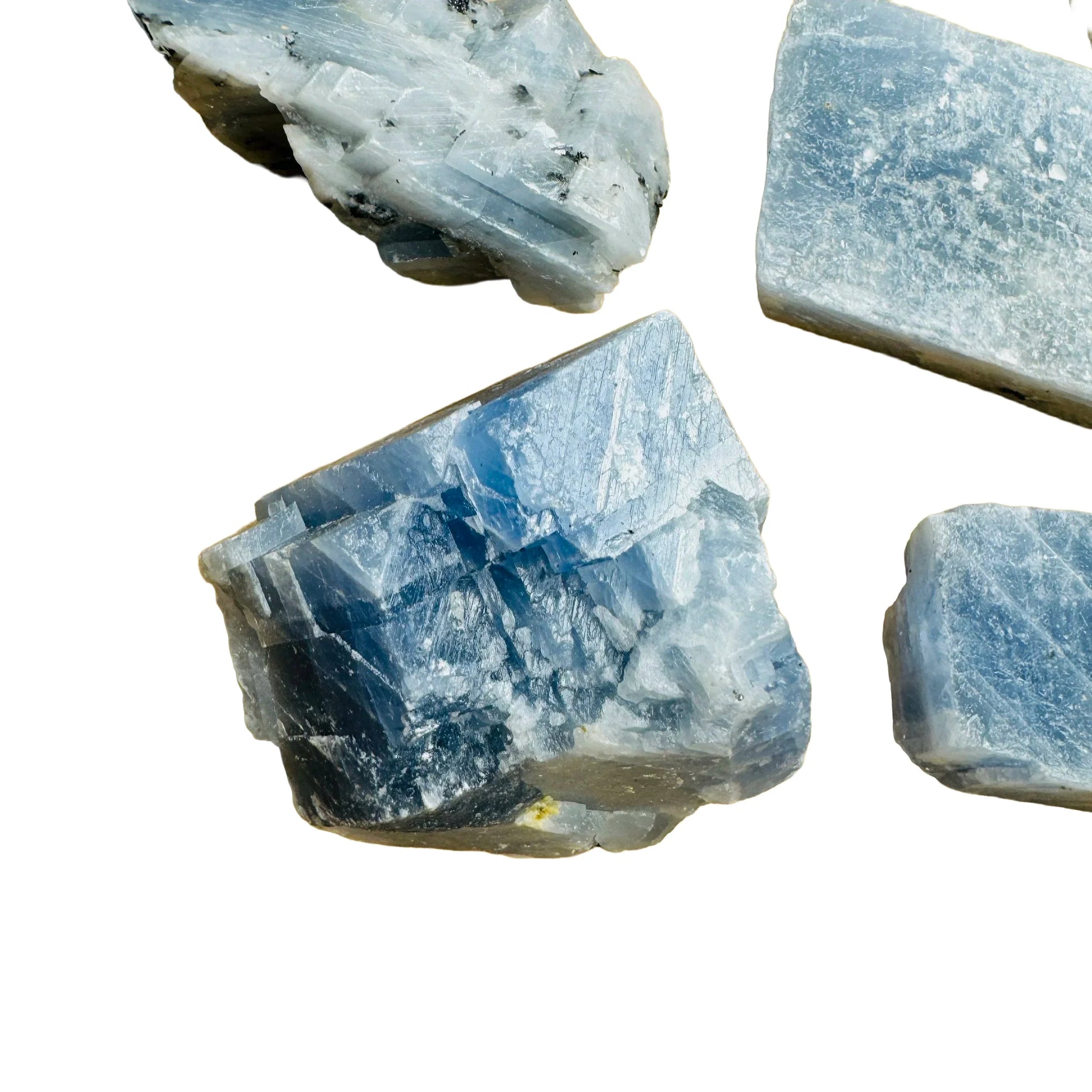 Detail shot showing Grade AA Blue Calcite raw stone, sourced from Erongo, Namibia, turned to for Stress Relief.
