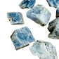 Top-side view of Blue Calcite raw stone, showing raw matrix.