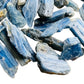 Grade aa blue kyanite raw held in hand for size reference