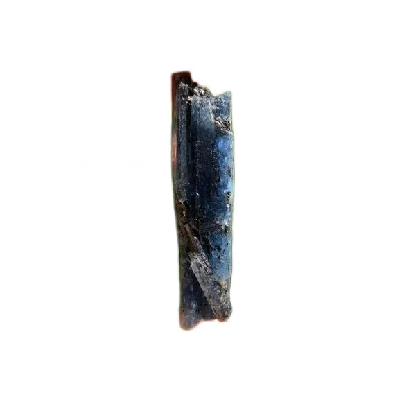 Daylight view of a Blue Kyanite raw stone held against natural backdrop.