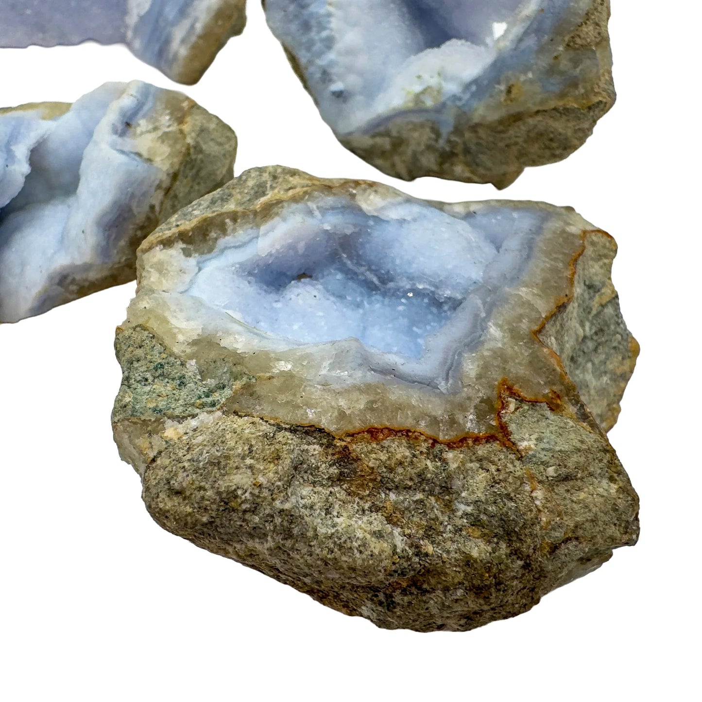 Overhead view of Blue Lace Agate raw geode, showing natural sheen.