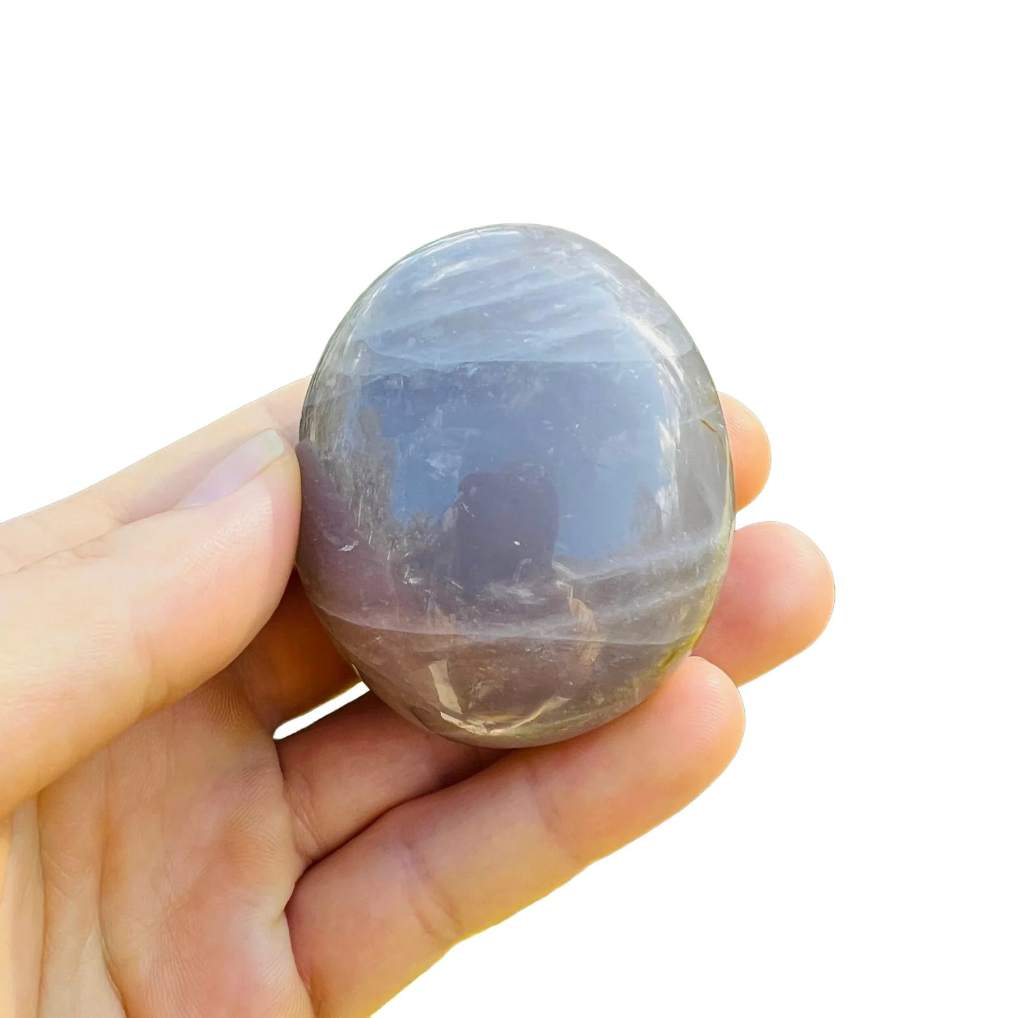 Surface detail of Grade A Blue Rose Quartz palm stone, showing matte finish.