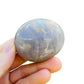 Natural light view of a Blue Rose Quartz palm stone, from Alaotra-Mangoro, Madagascar.