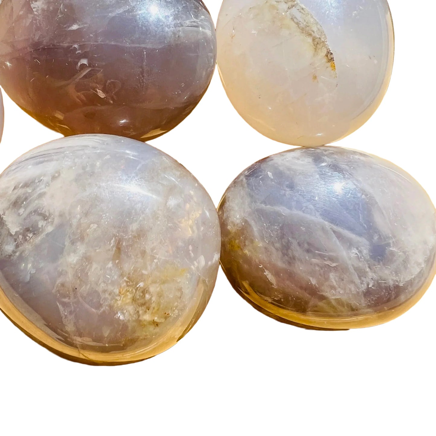 Back view of Grade A Blue Rose Quartz palm stone showing natural surface