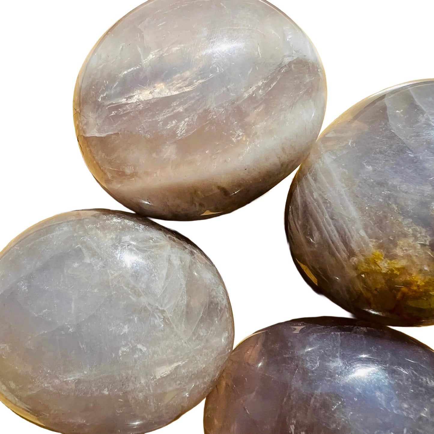 Detail shot of Grade A Blue Rose Quartz palm stone under natural light