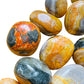 Edge-on view of Bumblebee Jasper tumbled stone, worked with for Confidence, from West Java, Indonesia.